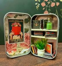Mini bookshelf created inside a tin.